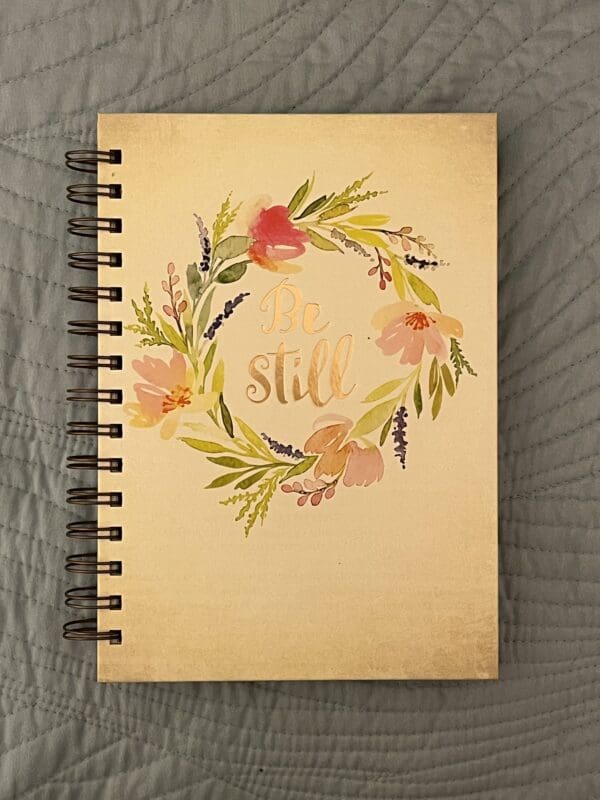 A notebook with the word still written on it.